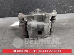 Mazda 2 Front brake calliper, left O684909 photo 3