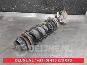 Nissan Micra Stoßdämpferstrebe links vorne O684965 foto 2