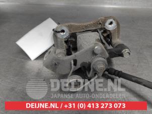 Hyundai I10 Rear brake calliper, left O685307 photo 2