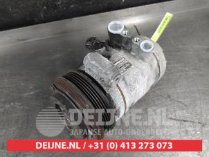Aircopomp van een Nissan NP 300 Navara (D23) 2.3 dCi twinturbo 16V 4x4 2021