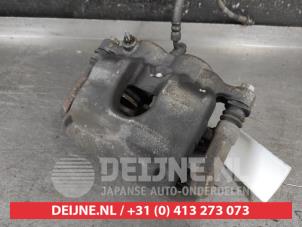 Nissan Navara Bremszange links vorne O685956 foto 2