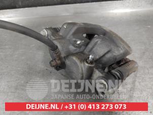 Nissan Navara Bremszange links vorne O685956 foto 3