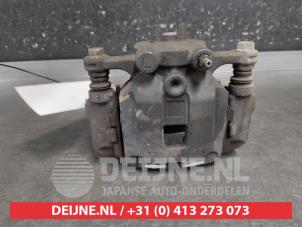 Suzuki Swift Remklauw (Tang) links-voor O686336 foto 3