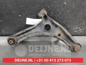 Mitsubishi Colt Front lower wishbone, left O686809 photo 2