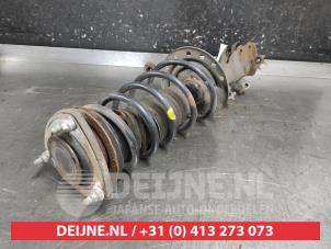 Toyota IQ Schokdemperpoot links-voor O687337 foto 2