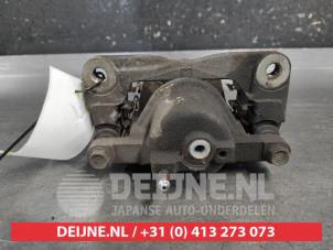 Toyota IQ Bremszange rechts vorne O687342 foto 2