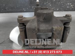 Toyota IQ Bremszange rechts vorne O687342 foto 3