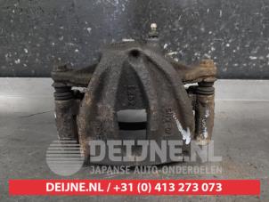 Toyota Avensis Front brake calliper, left O687357 photo 3
