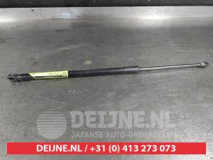 Mazda 2 Rear gas strut, left O687396 photo 2