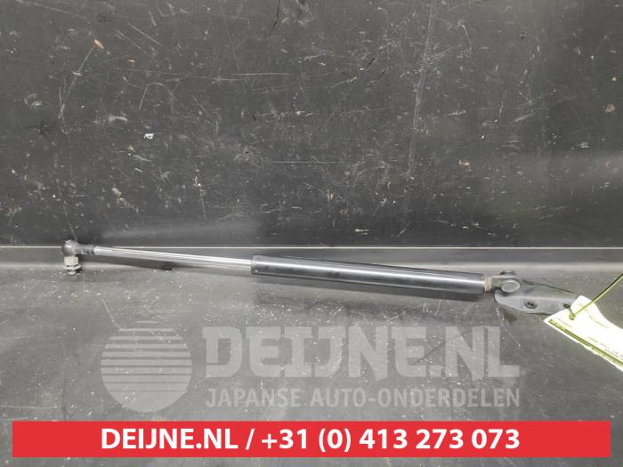 Daihatsu Materia Gasdemper links-achter O688038