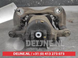 Kia Rio Front brake calliper, left O688540 photo 2