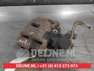 Hyundai I10 Rear brake calliper, left O689322 photo 2