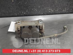 Toyota Rav-4 Bremszange links vorne O689552 foto 2