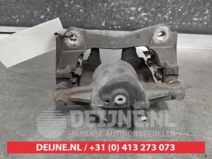 Toyota Avensis Front brake calliper, left O689745 photo 2