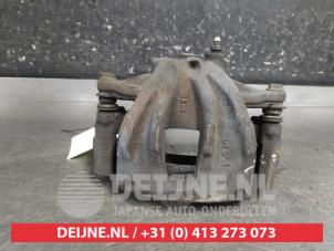 Toyota Avensis Front brake calliper, left O689745 photo 3