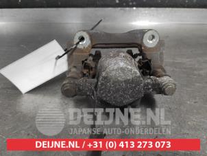 Toyota Avensis Bremszange links hinten O689747 foto 2