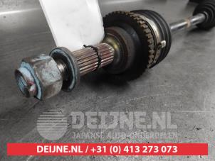 Chevrolet Spark Aandrijfas links-voor O690443 foto 2