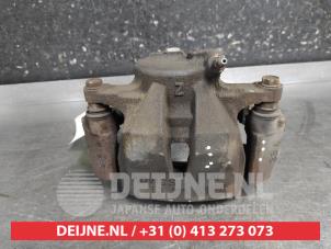 Toyota Prius Plus Bremszange links vorne O690998 foto 3