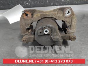 Toyota Prius Plus Bremszange links vorne O690998 foto 2