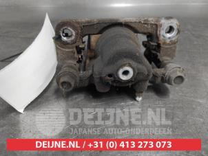 Nissan X-Trail Remklauw (Tang) rechts-achter O691384 foto 2