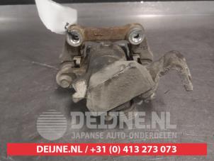Suzuki Swift Rear brake calliper, right O691962 photo 2