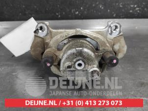 Toyota Yaris Front brake calliper, left O692867 photo 2
