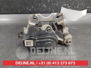 Toyota Yaris Bremszange rechts hinten O692869 foto 2
