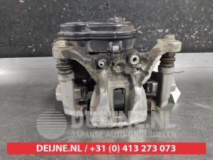 Toyota Yaris Bremszange rechts hinten O692869 foto 3