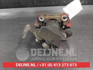 Suzuki Swift Remklauw (Tang) links-achter O692979 foto 2