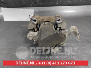 Suzuki Swift Rear brake calliper, right O692980 photo 2