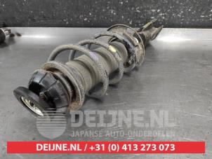 Suzuki Swift Front shock absorber rod, left O692981 photo 2