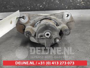 Toyota Aygo X Front brake calliper, left O693017 photo 2
