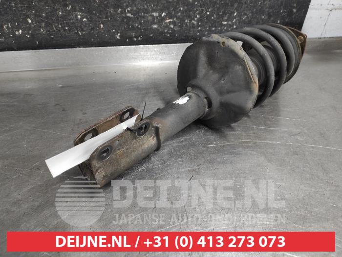 Suzuki Swift Schokdemperpoot links-voor O693107