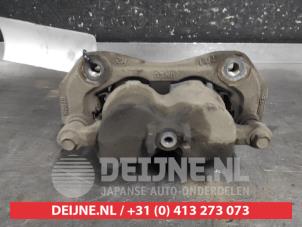 Kia Sorento Front brake calliper, left O693376 photo 2