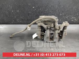 Toyota Corolla Bremszange links hinten O693790 foto 3