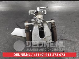 Mitsubishi Colt Bremszange links hinten O695065 foto 3