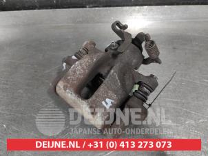Toyota Auris Rear brake calliper, left O695432 photo 2