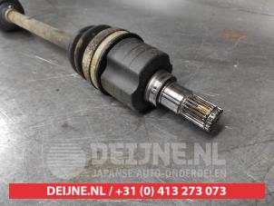 Suzuki Swift Aandrijfas links-voor O695622 foto 3