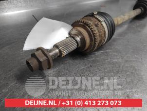 Suzuki Swift Aandrijfas links-voor O695622 foto 2