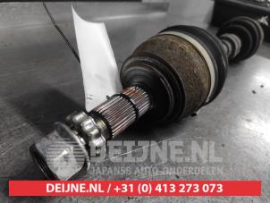 Nissan X-Trail Front drive shaft, left O695649 photo 2