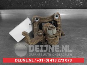 Suzuki Swift Remklauw (Tang) links-achter O696038 foto 2