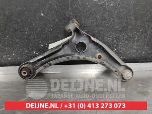 Mitsubishi Colt Front lower wishbone, left O696139 foto 2