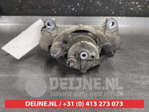 Toyota Yaris Bremszange rechts vorne O696439 foto 2