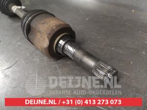 Nissan Qashqai+2 Aandrijfas links-voor O696469 foto 3