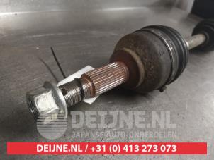 Nissan Qashqai+2 Aandrijfas links-voor O696469 foto 2