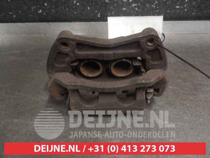 Nissan Qashqai+2 Bremszange rechts vorne O696471
