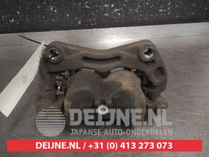 Nissan Qashqai+2 Front brake calliper, right O696471 photo 2