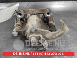 Kia Ceed Remklauw (Tang) links-achter O696650 foto 2