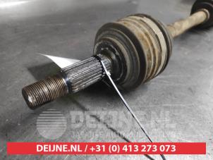 Toyota Verso-S Front drive shaft, left O696754 photo 2
