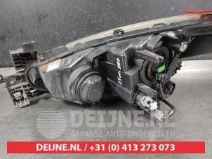 Mazda 3 Koplamp rechts O697153 foto 2